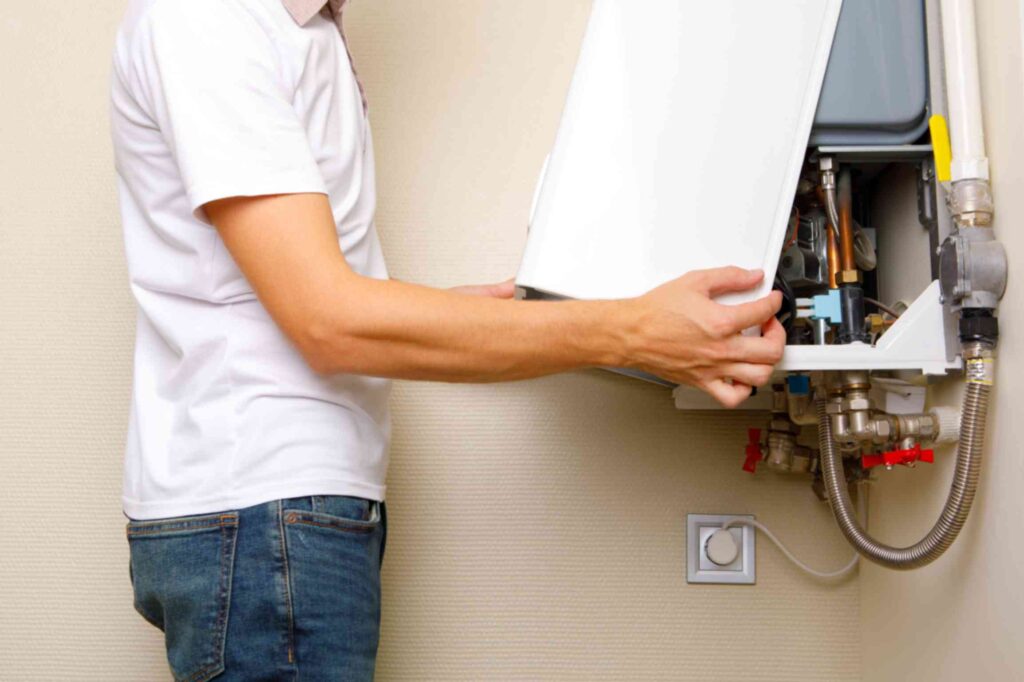 plumber-attaches-trying-fix-problem-with-residential-heating-equipment-repair-gas-boiler